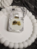 Gold twin flower textured ring in a clear gift box