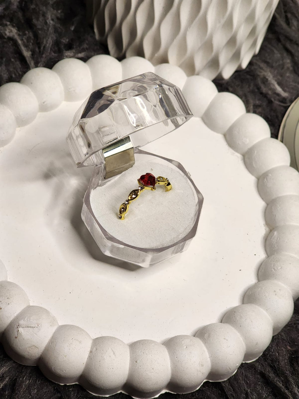 Red heart CZ gold ring in crystal box - front view