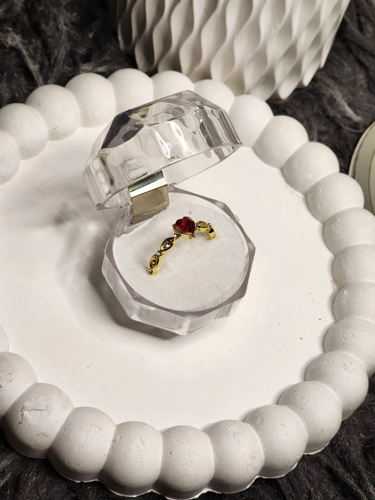 Red heart CZ gold ring in crystal box - front view