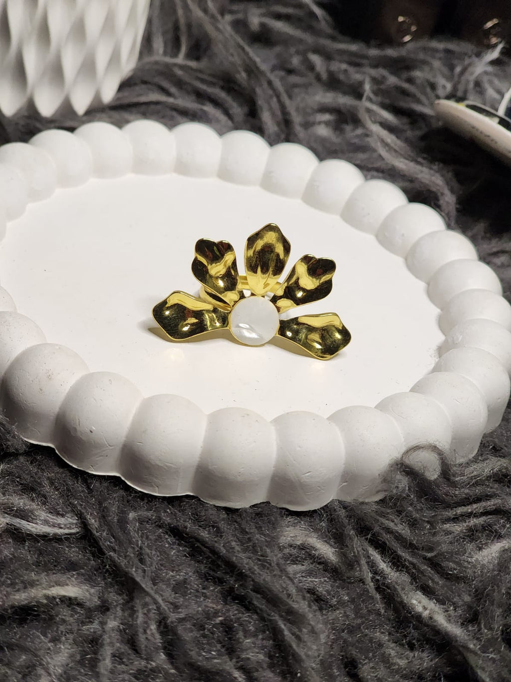 Gold Bloom Pearl Ring — reflected in compact mirror