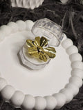Gold Sculpted Bloom Ring — displayed in open crystal ring box on white tray