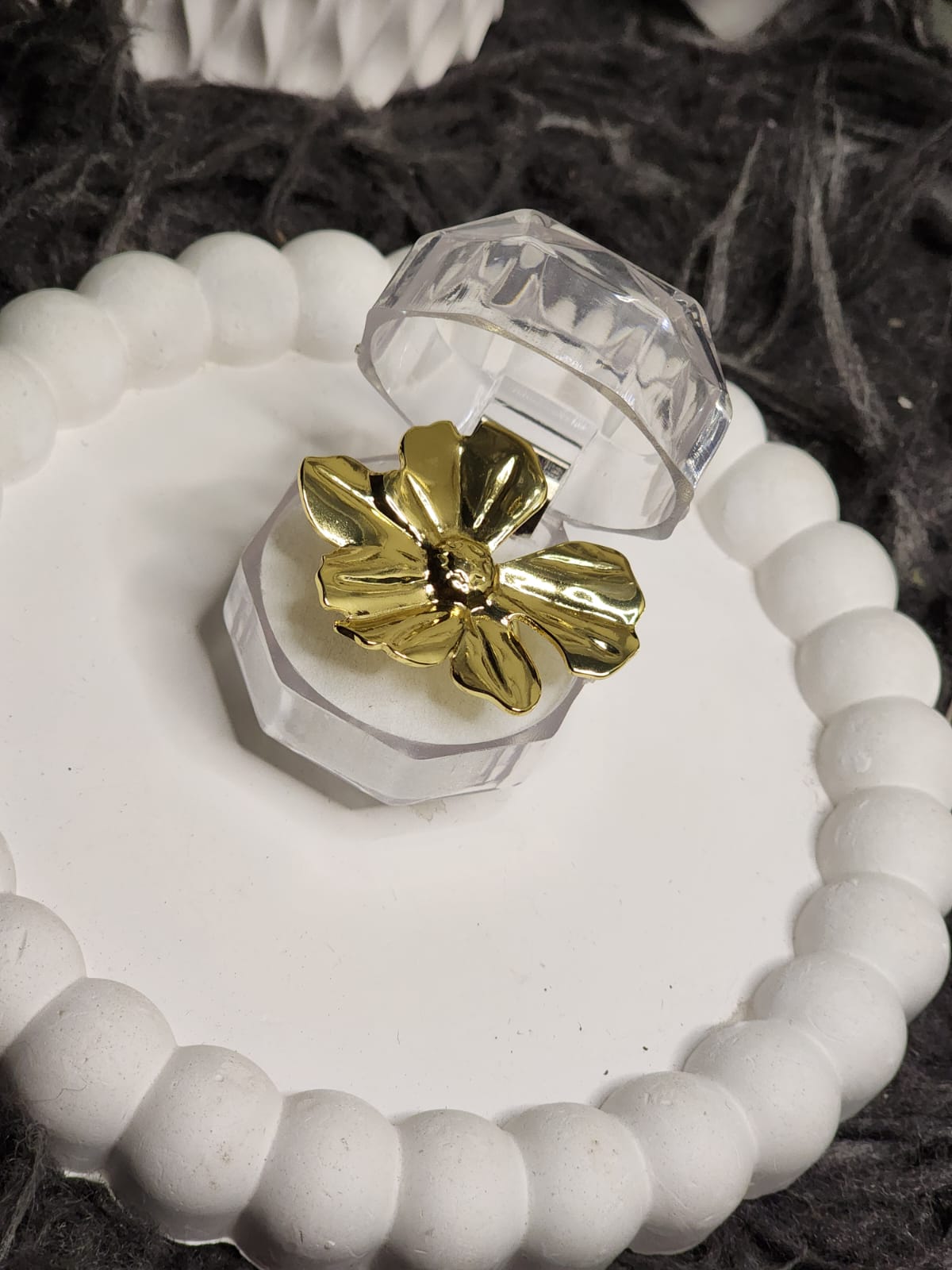 Gold Sculpted Bloom Ring — displayed in open crystal ring box on white tray