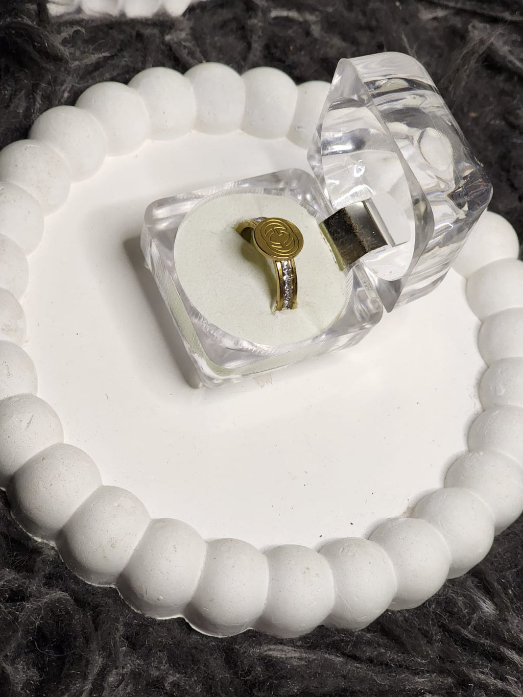 Swirl Coin Ring – side view in box
