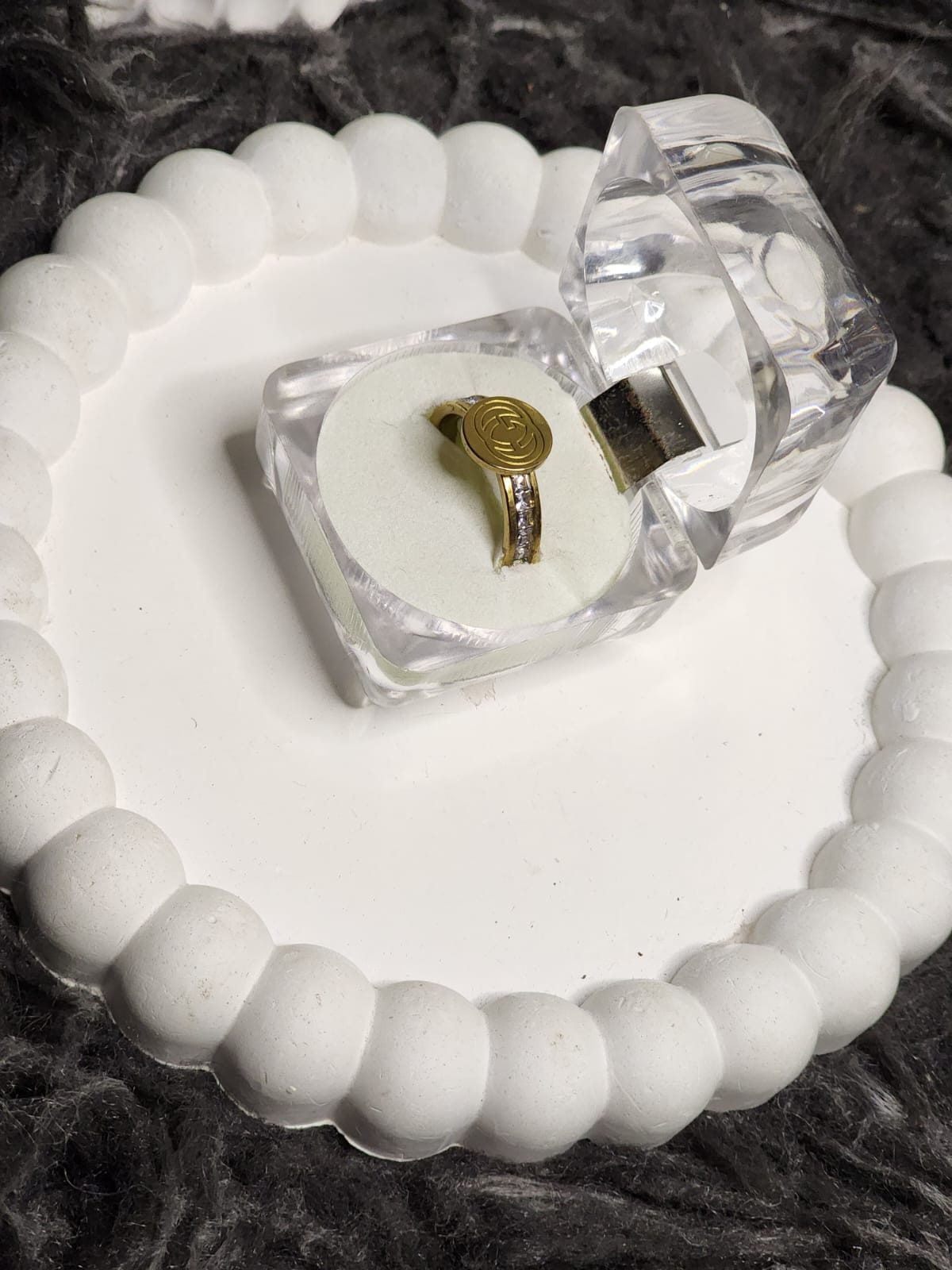 Swirl Coin Ring – side view in box