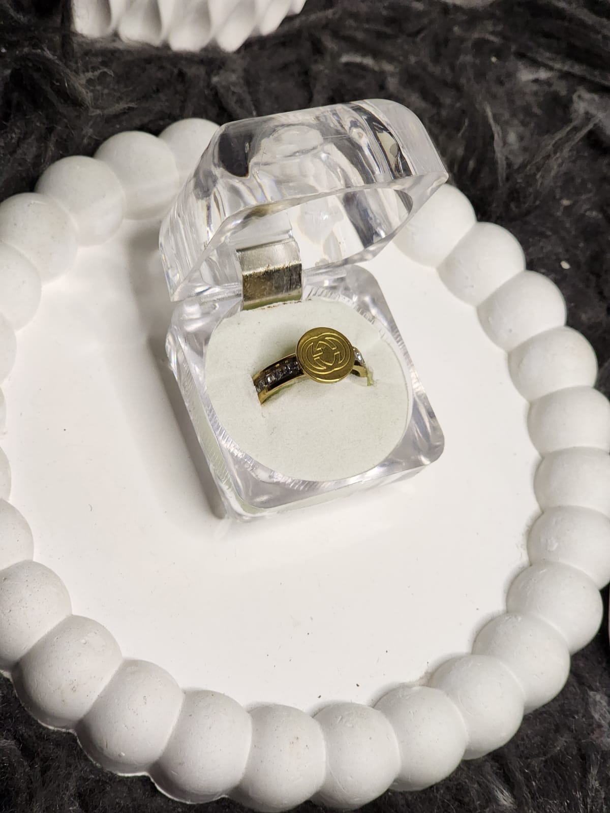 Swirl Coin Ring – angle view in box
