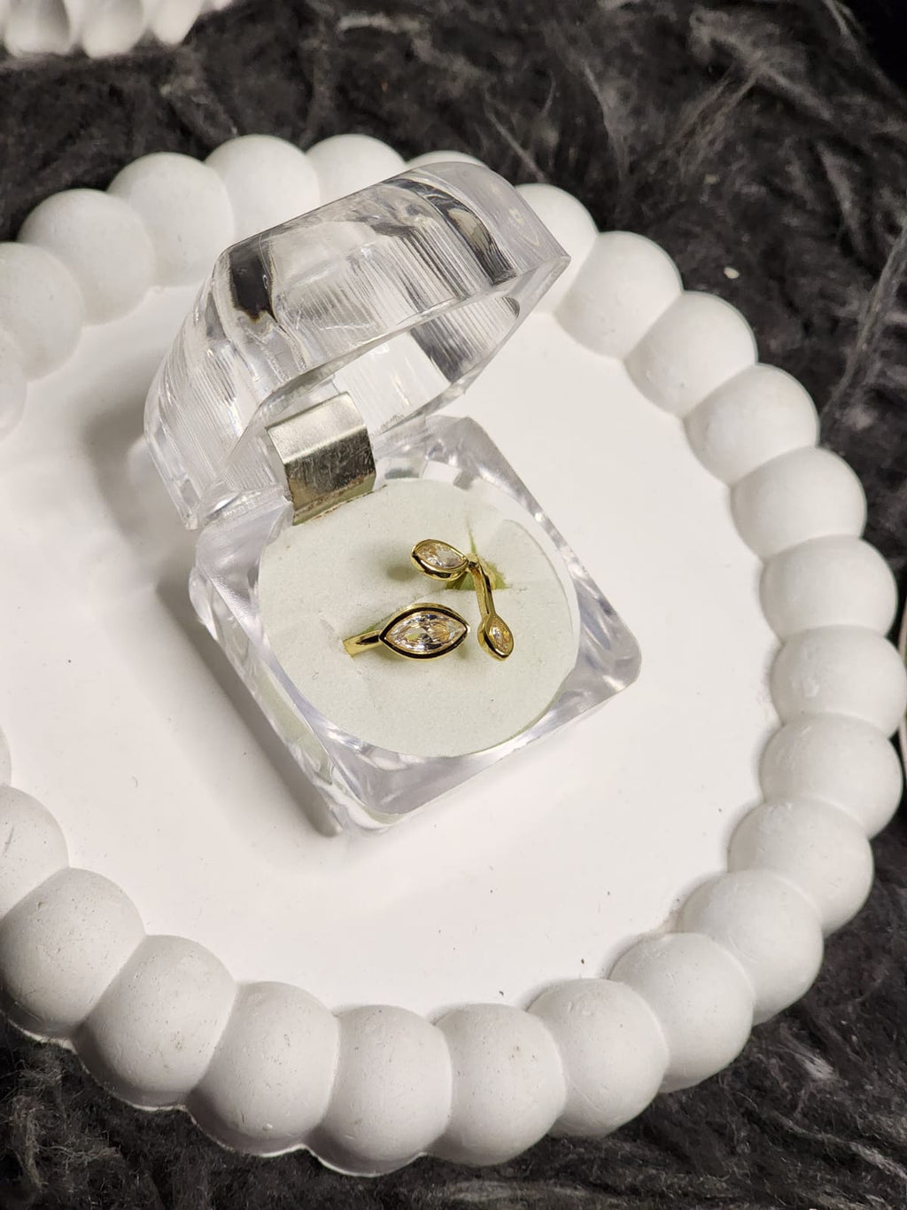 Crystal leaf marquise ring overhead view in acrylic gift box