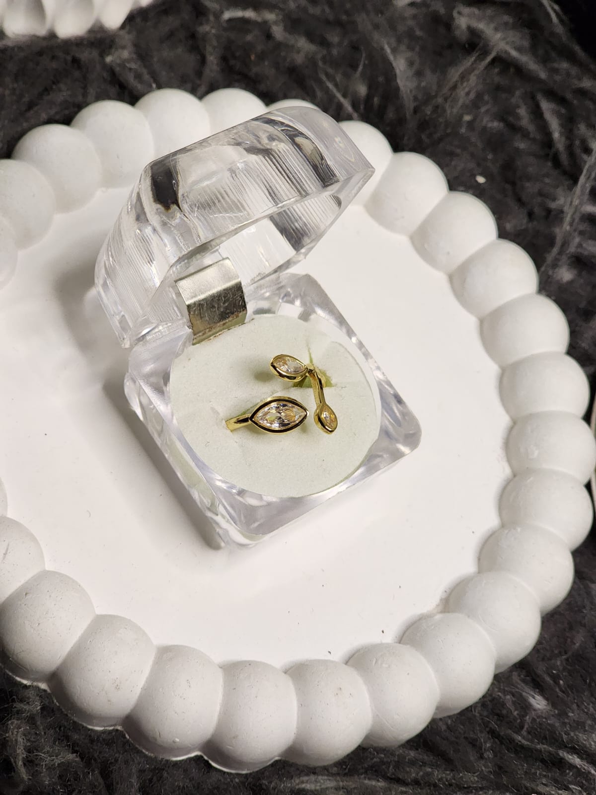 Crystal leaf marquise ring overhead view in acrylic gift box
